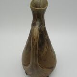 Denbac pitcher mounts lion paws