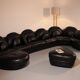 Organically shaped post-modern sectional sofa in black leather