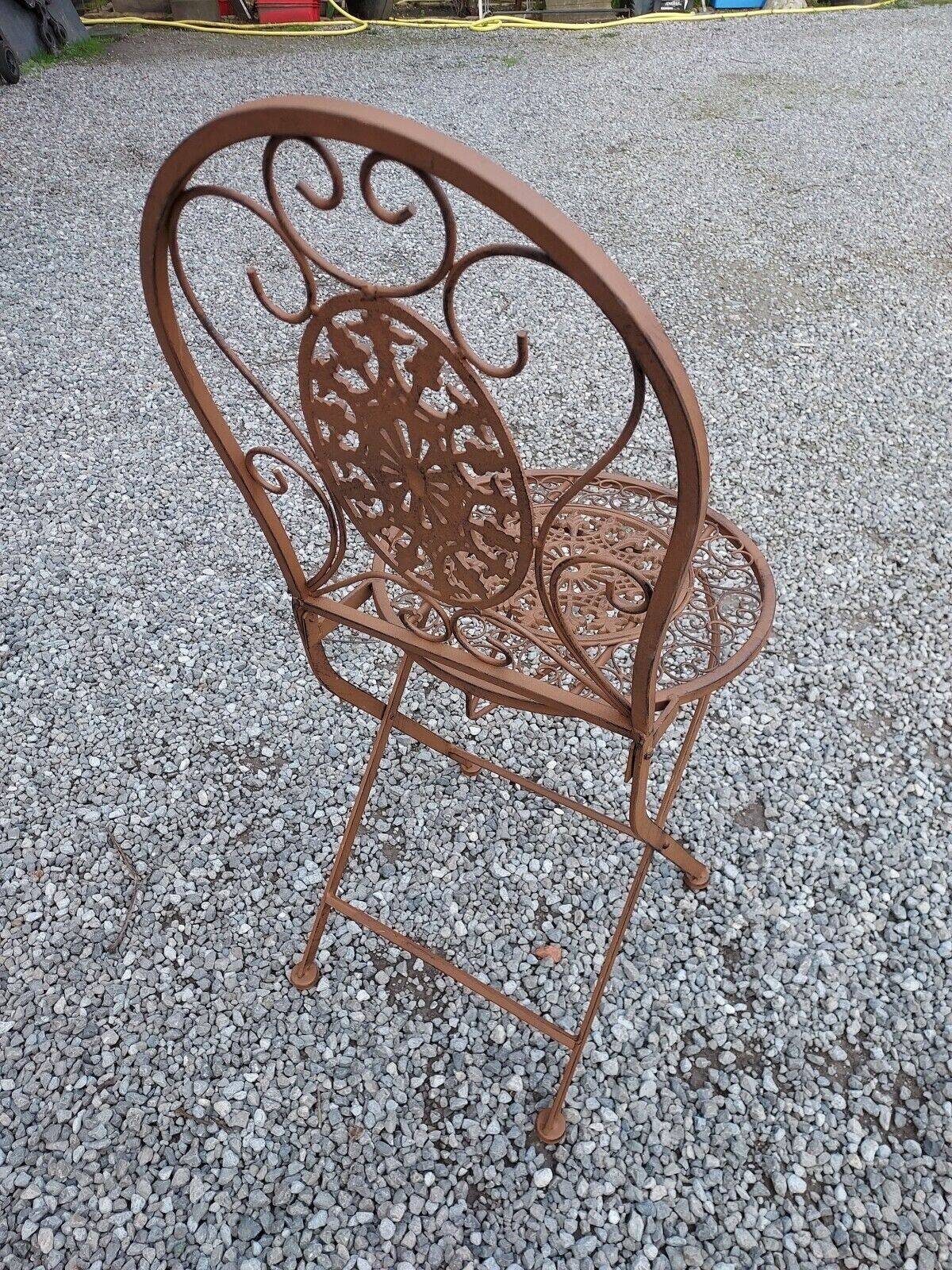 Garden furniture in brown patinated iron