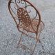 Garden furniture in brown patinated iron