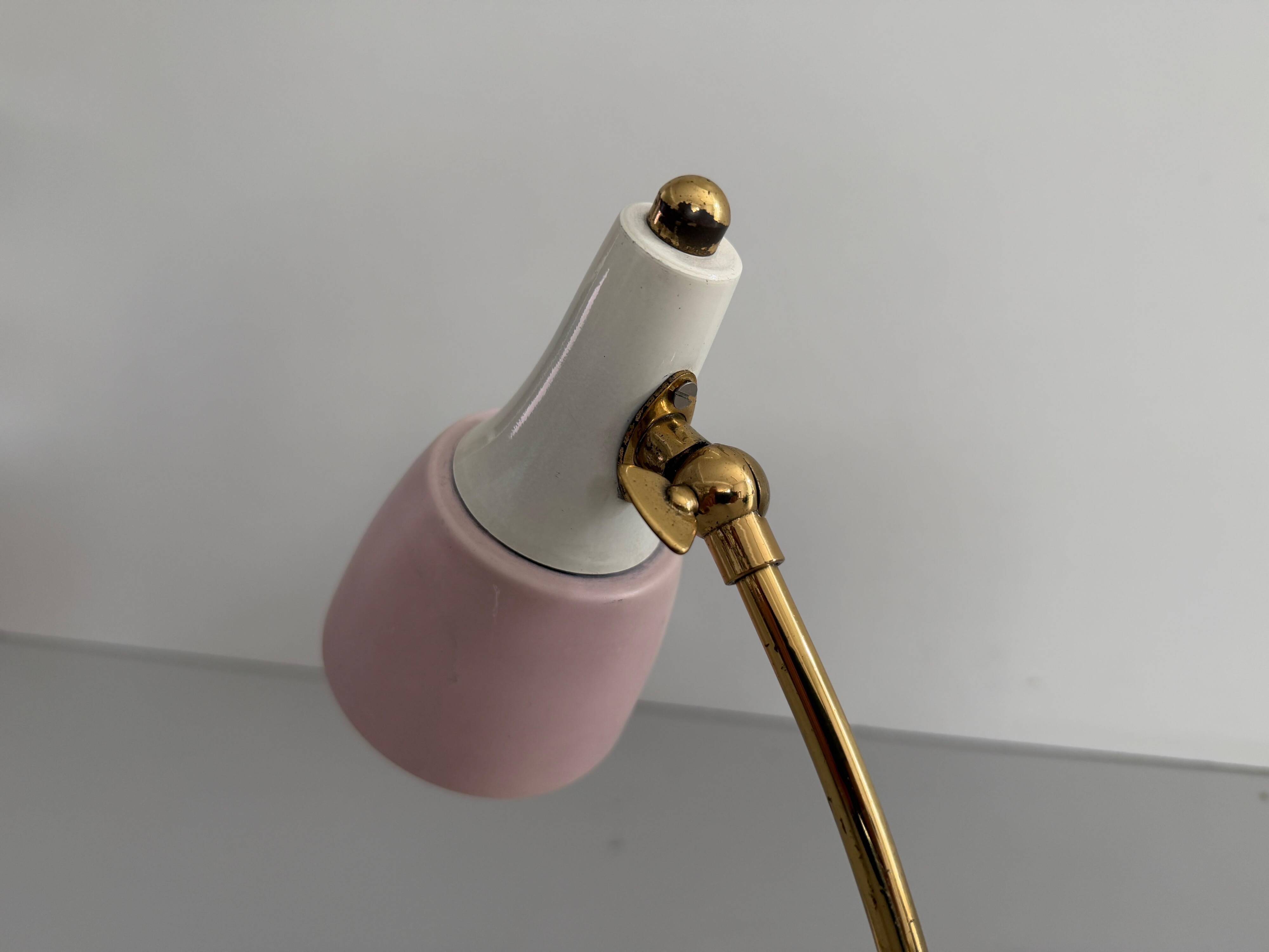 Simple table lamp with a pink metal head and brass body, 1960s, Germany.