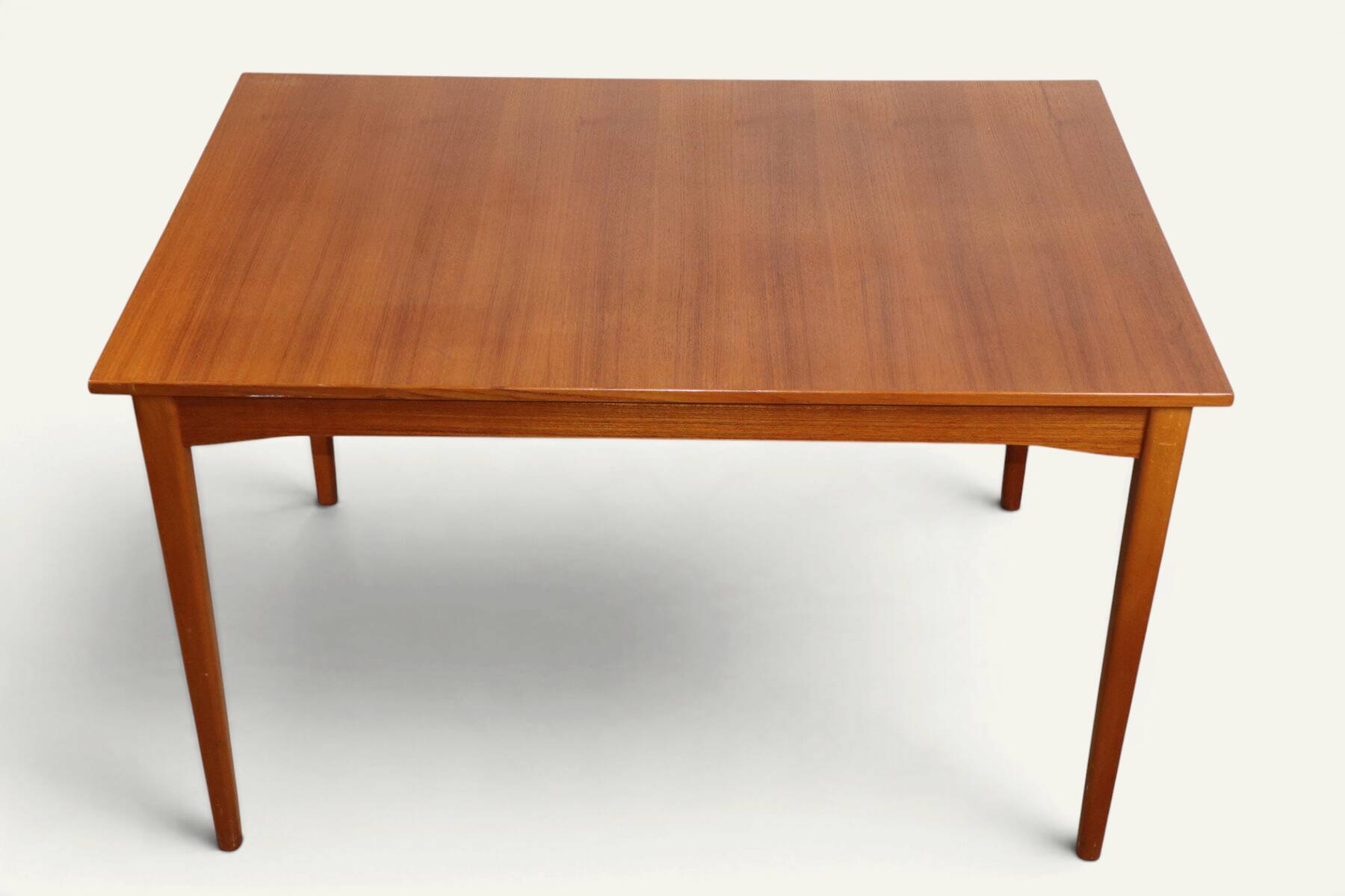 Rectangular extendable dining table in Scandinavian teak – 1960s