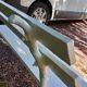 Old garden bench with cast iron feet and wooden planks