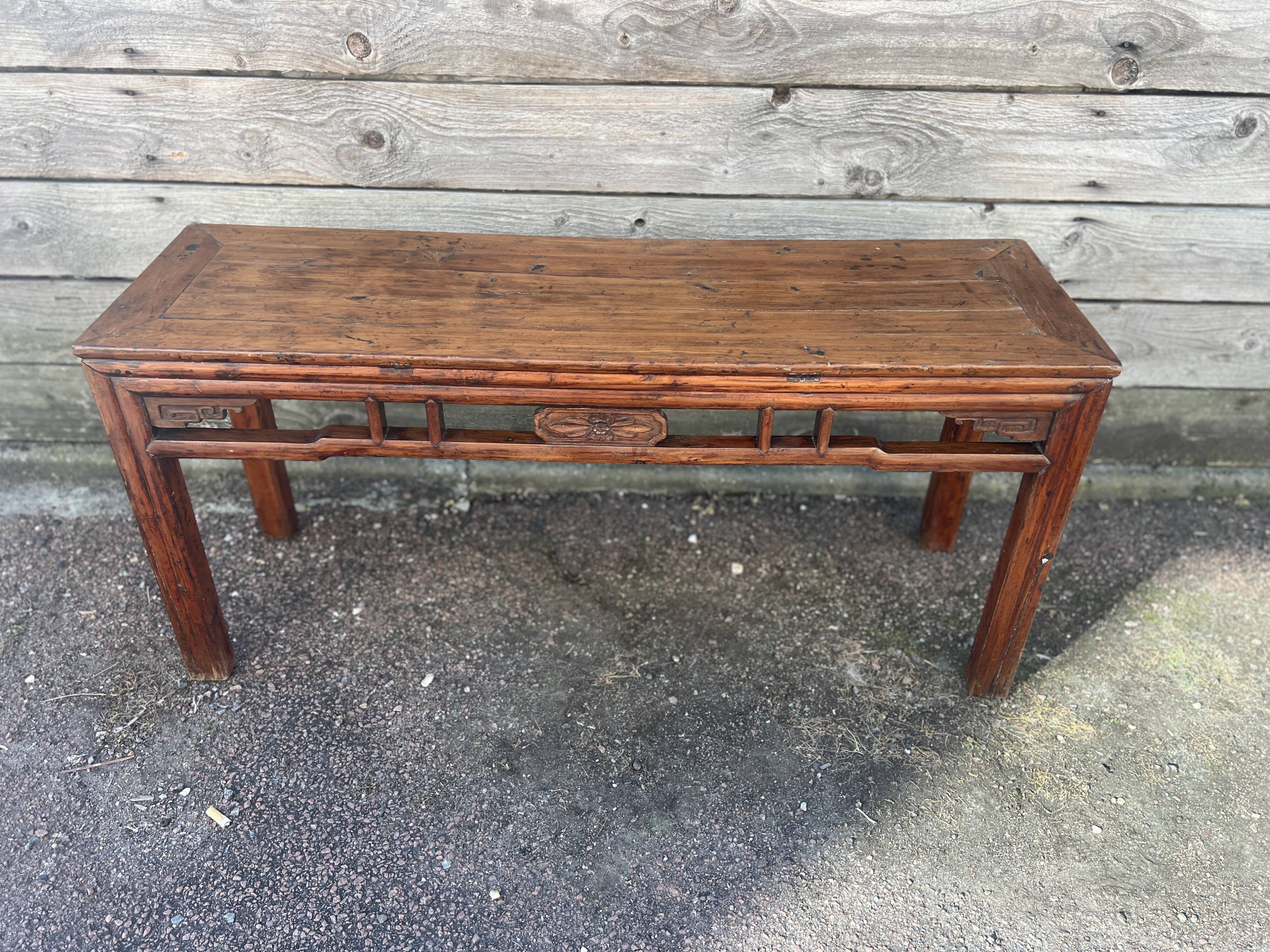 Asian low console in natural wood