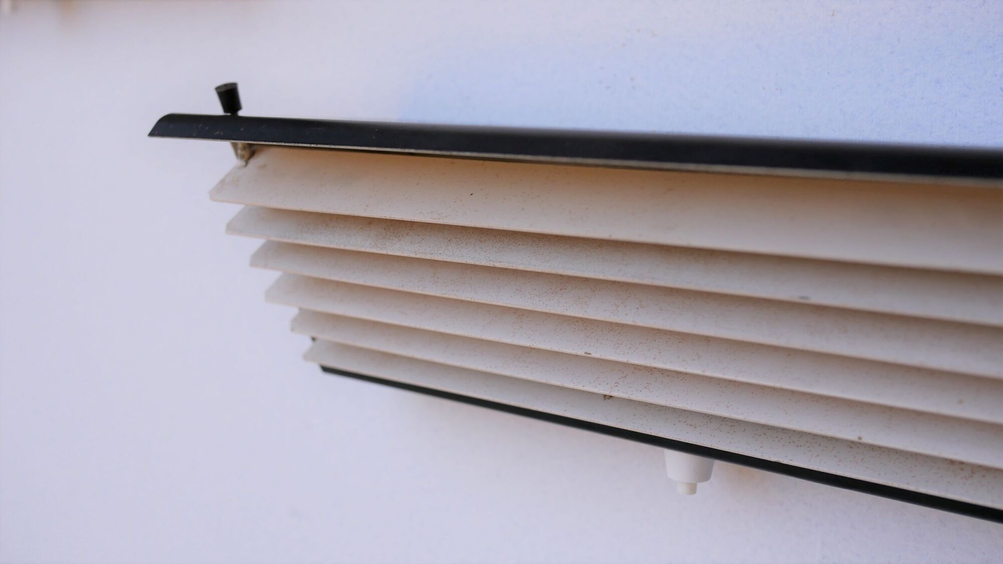 Pair of modernist metal wall light model 212, by Jacques Biny for Luminalite