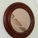 Antique round wooden mirror