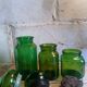 Trio de flacons d'apothicaire en verre vert