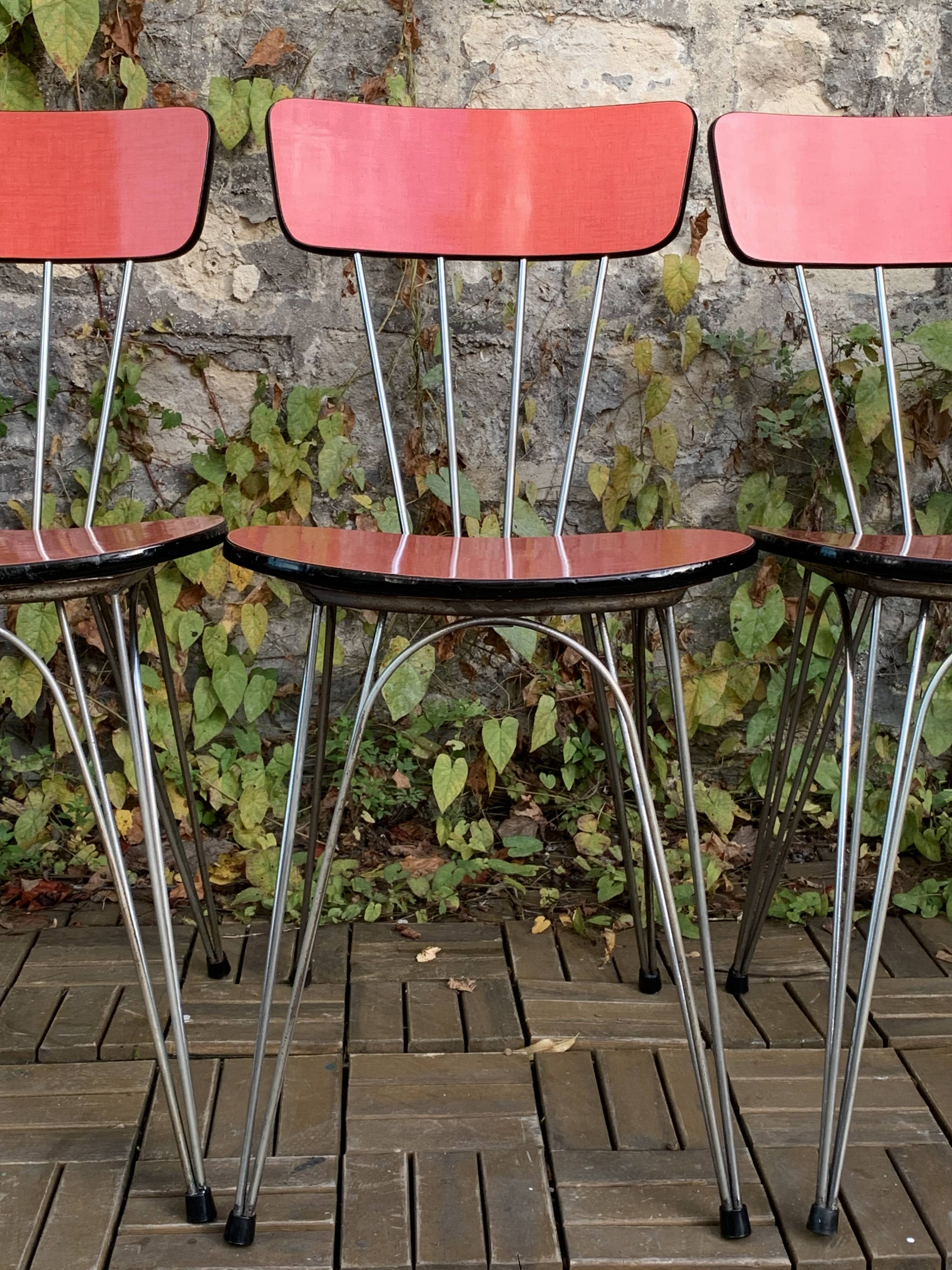 4 red Formica chairs with Eiffel legs, 1950s