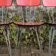 4 red Formica chairs with Eiffel legs, 1950s