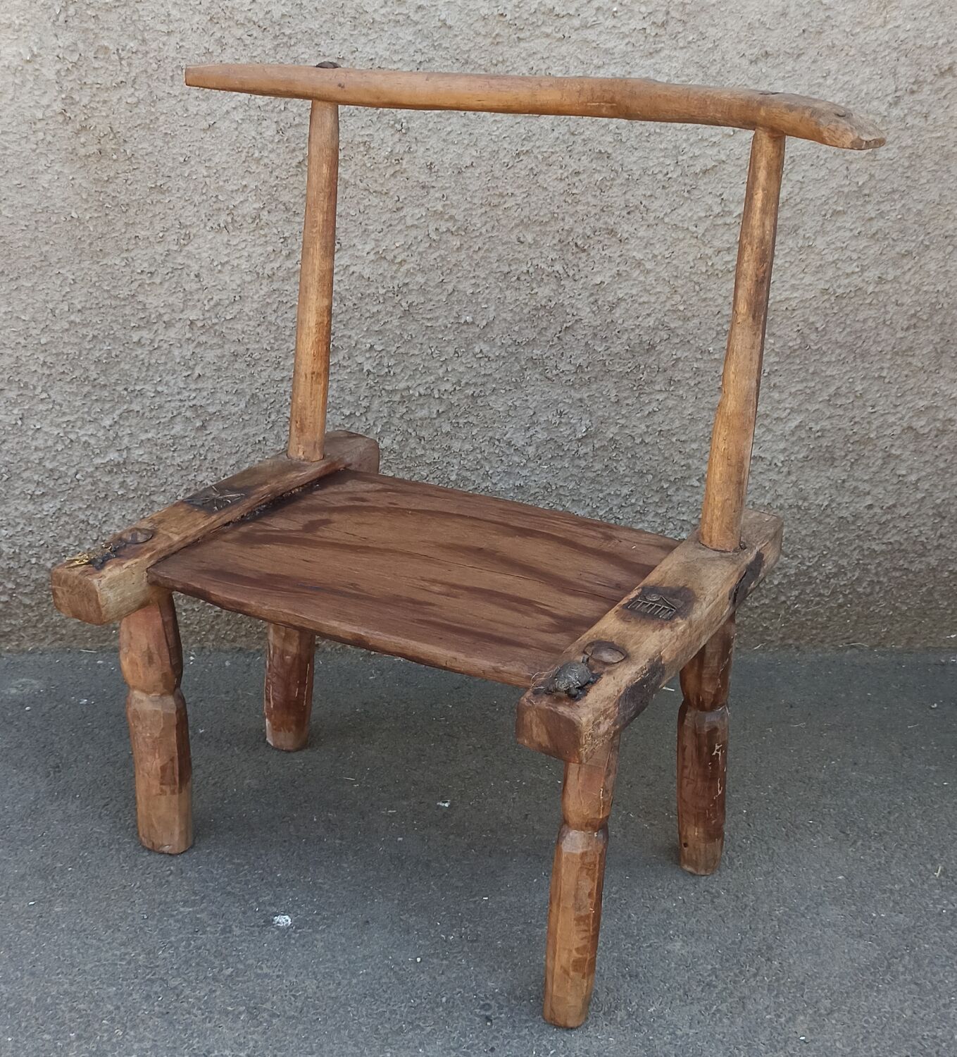 Antique wooden stool. Baoulé African art from Ivory Coast.