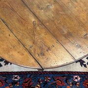 Oval coffee table in fir from the early 20th century.
