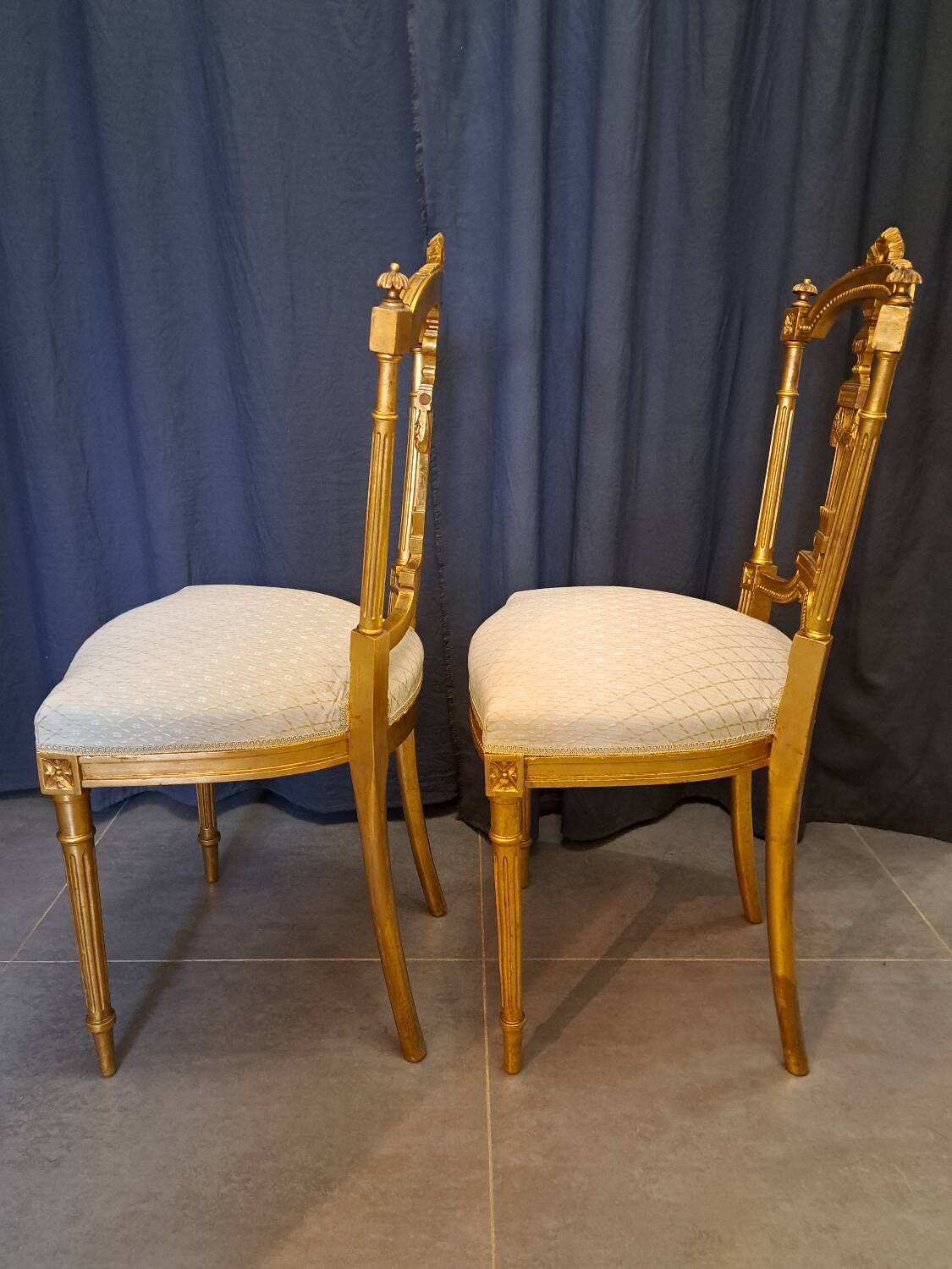 Pair of Napoleon III chairs in gilded wood
