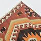 Tapis kilim vintage géométrique fait main – Explosion de motifs ethniques