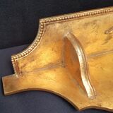 Golden wooden shelf