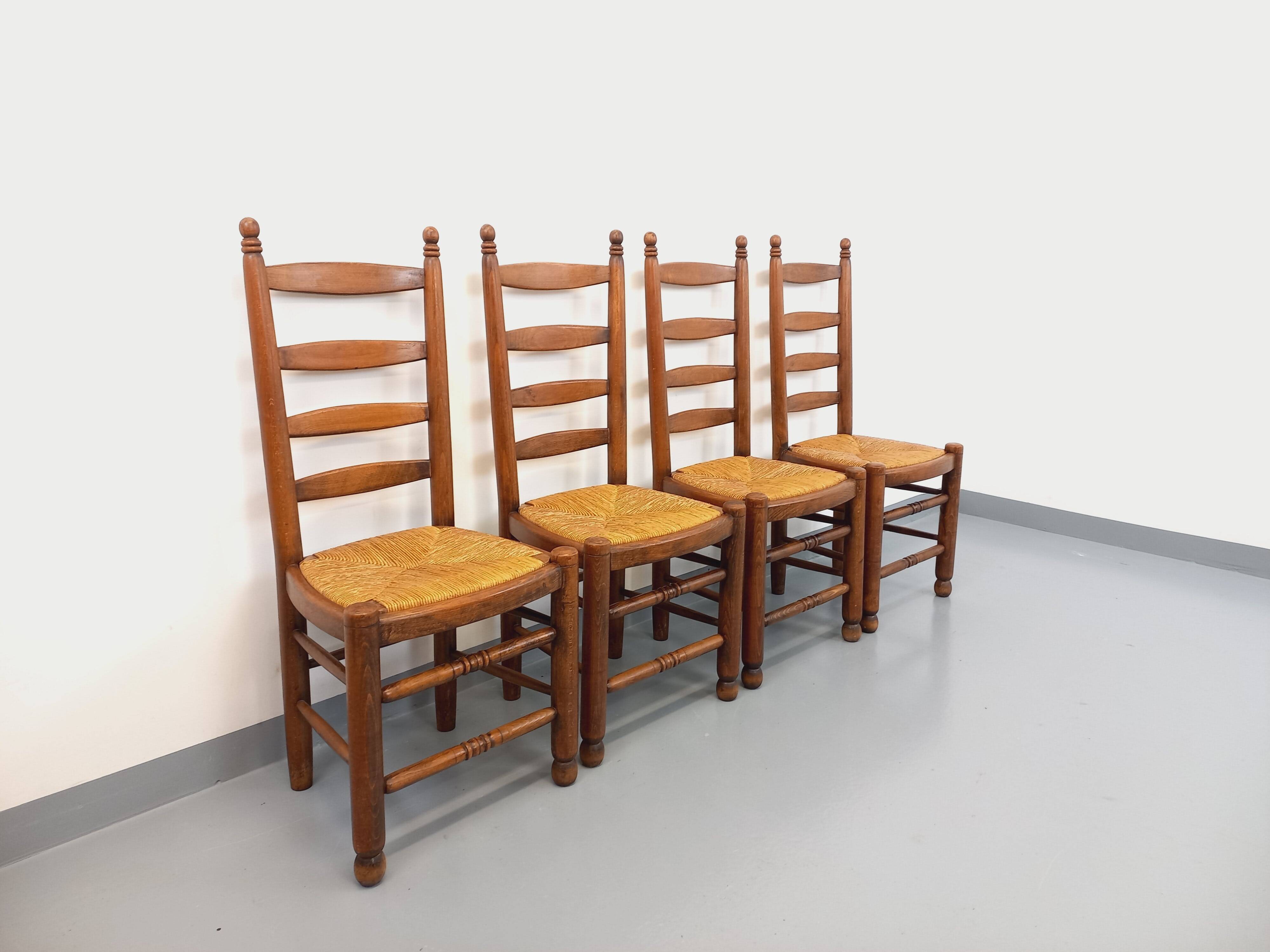 Set of 4 vintage brutalist Charles Dudouyt chairs in wood and straw from the 60s