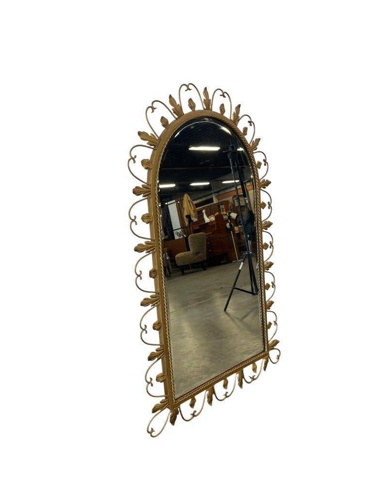 Vintage gold wall mirror with leaves