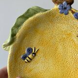 Lemon fruit barbotine plate with flowers and bees in ceramic