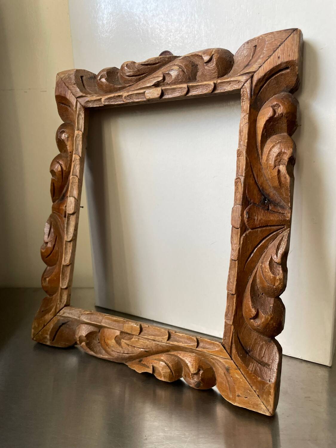 Antique handcarved frame   solid wood 33.5  x 29 cm  opening measurements 23.5 cm x 19 cm cedar wood