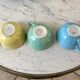 Set of 8 pastel colored cups Digoin Sarreguemines 50s
