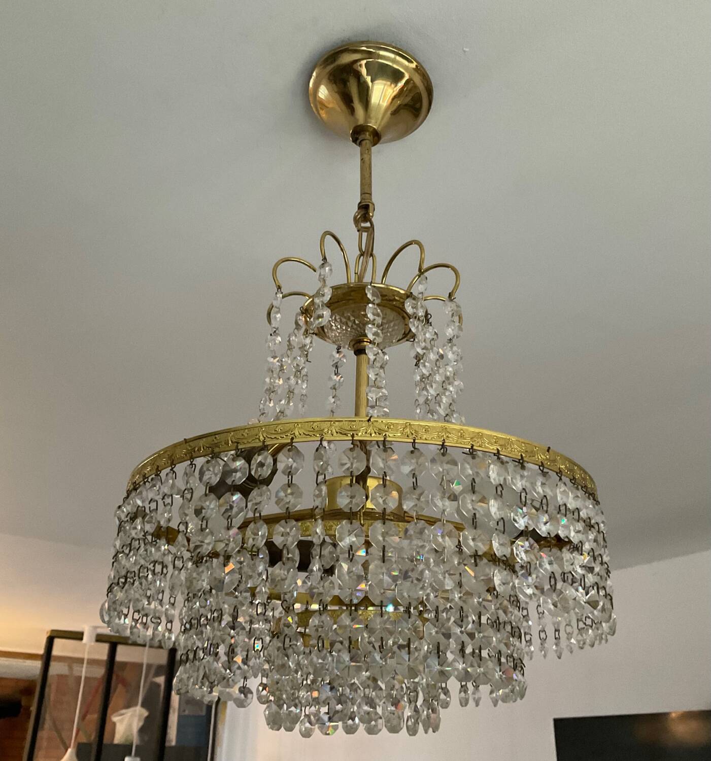 Cascade chandelier with crystal and brass tassels