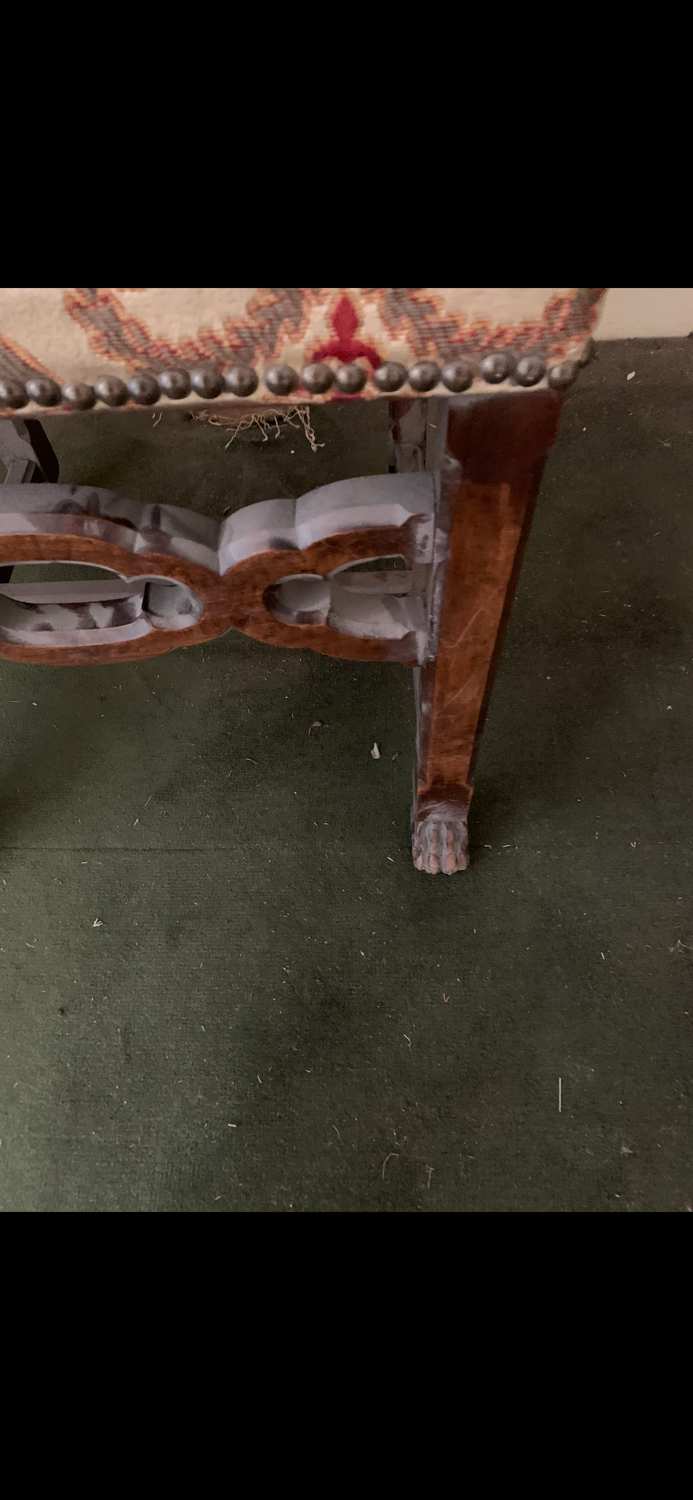 Antique wooden chair with upholstery