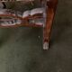 Antique wooden chair with upholstery
