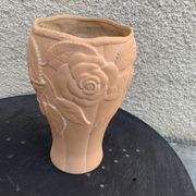 Terracotta vase with a vintage ceramic relief rose pattern