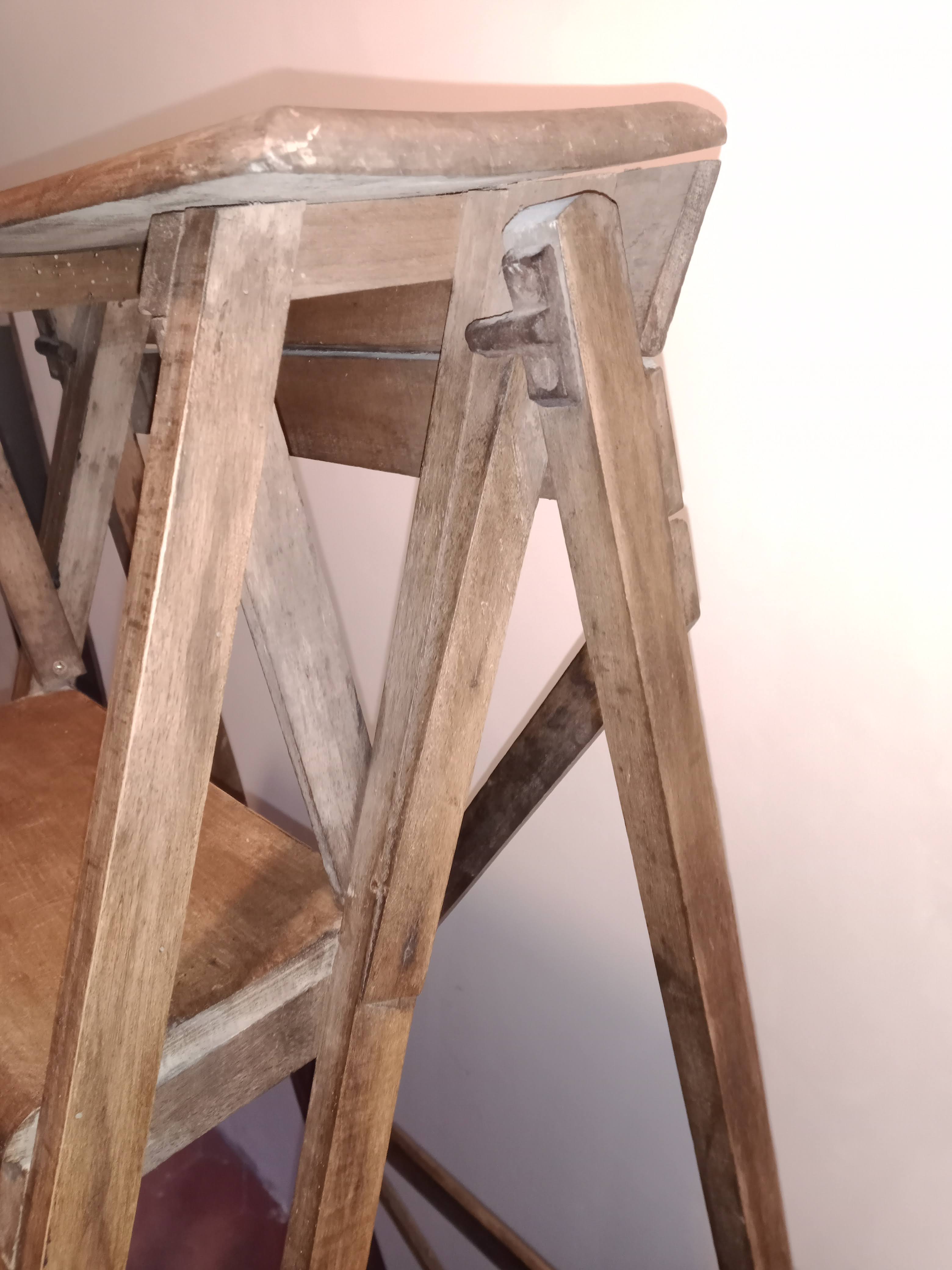 Old wooden stepladder six steps