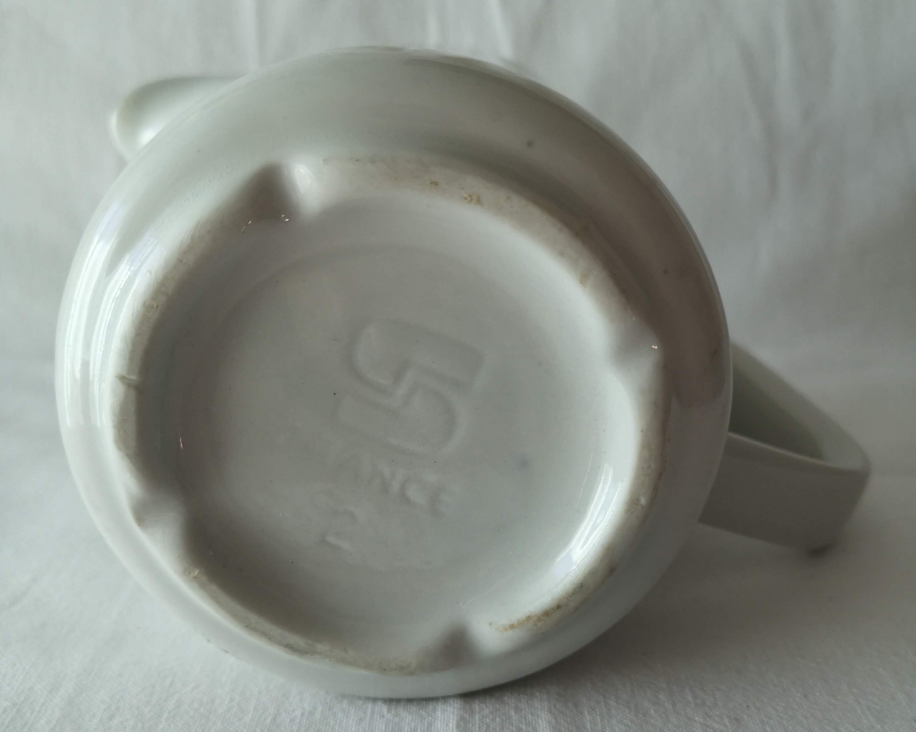 Limoges white earthenware milk pitcher