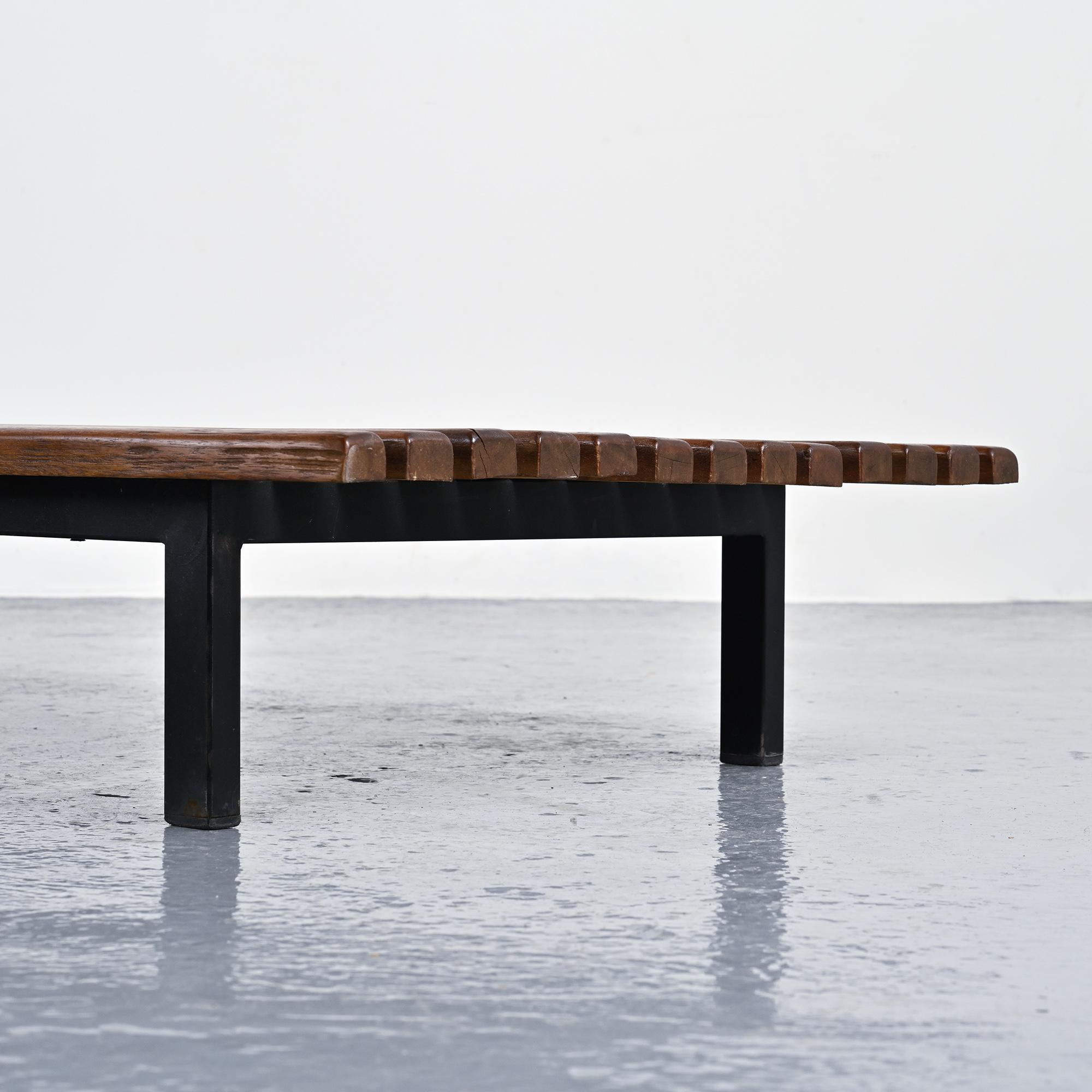 Cansado bench in mahogany by Charlotte Perriand, circa 1962.