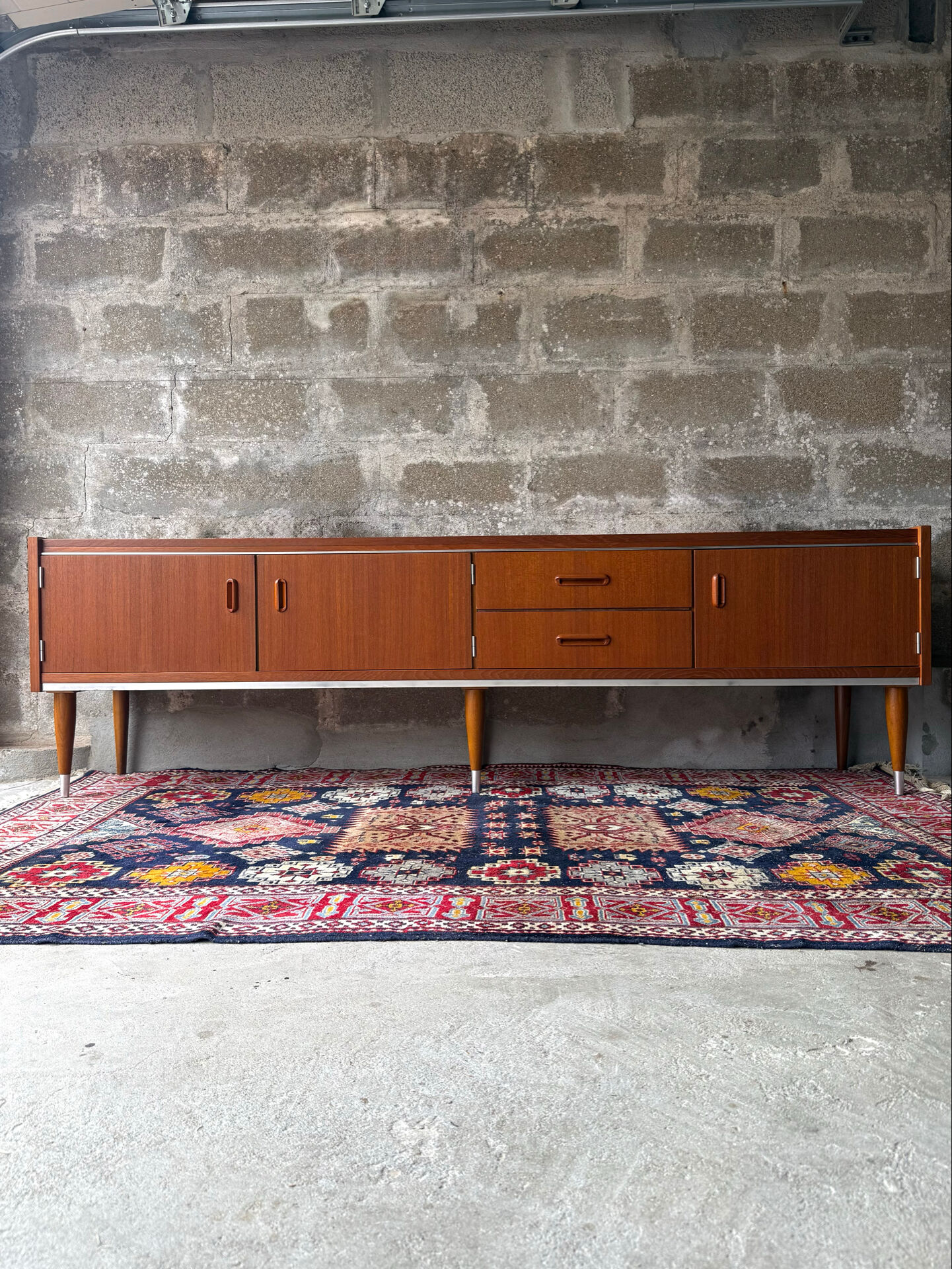 Scandinavian low sideboard in teak, 1960.