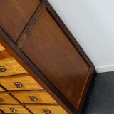 School cabinet bank of vintage Dutch drawers in mid-twentieth century pine