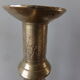 Old candle holder in gilded bronze