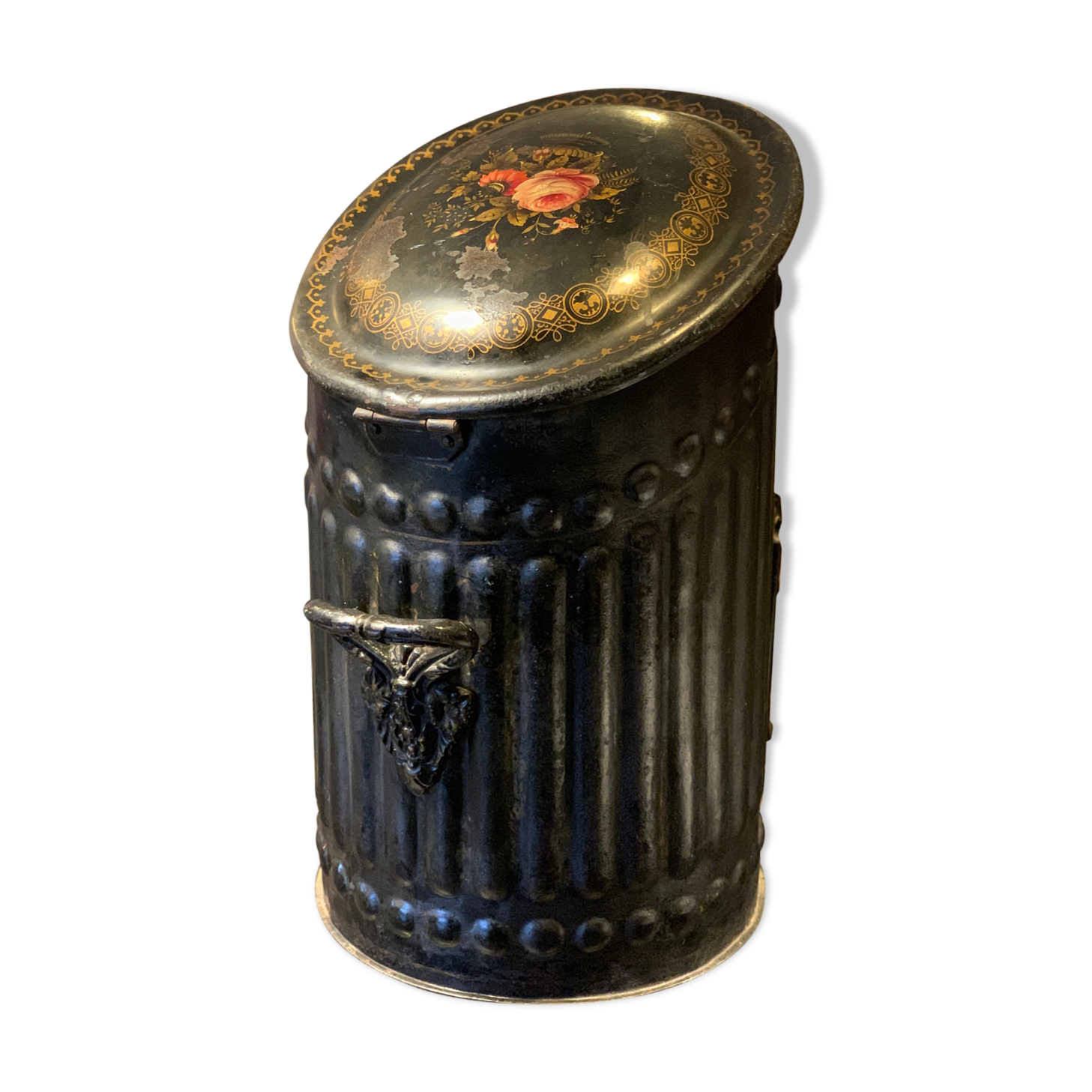 Coal tray decorated in black sheet metal