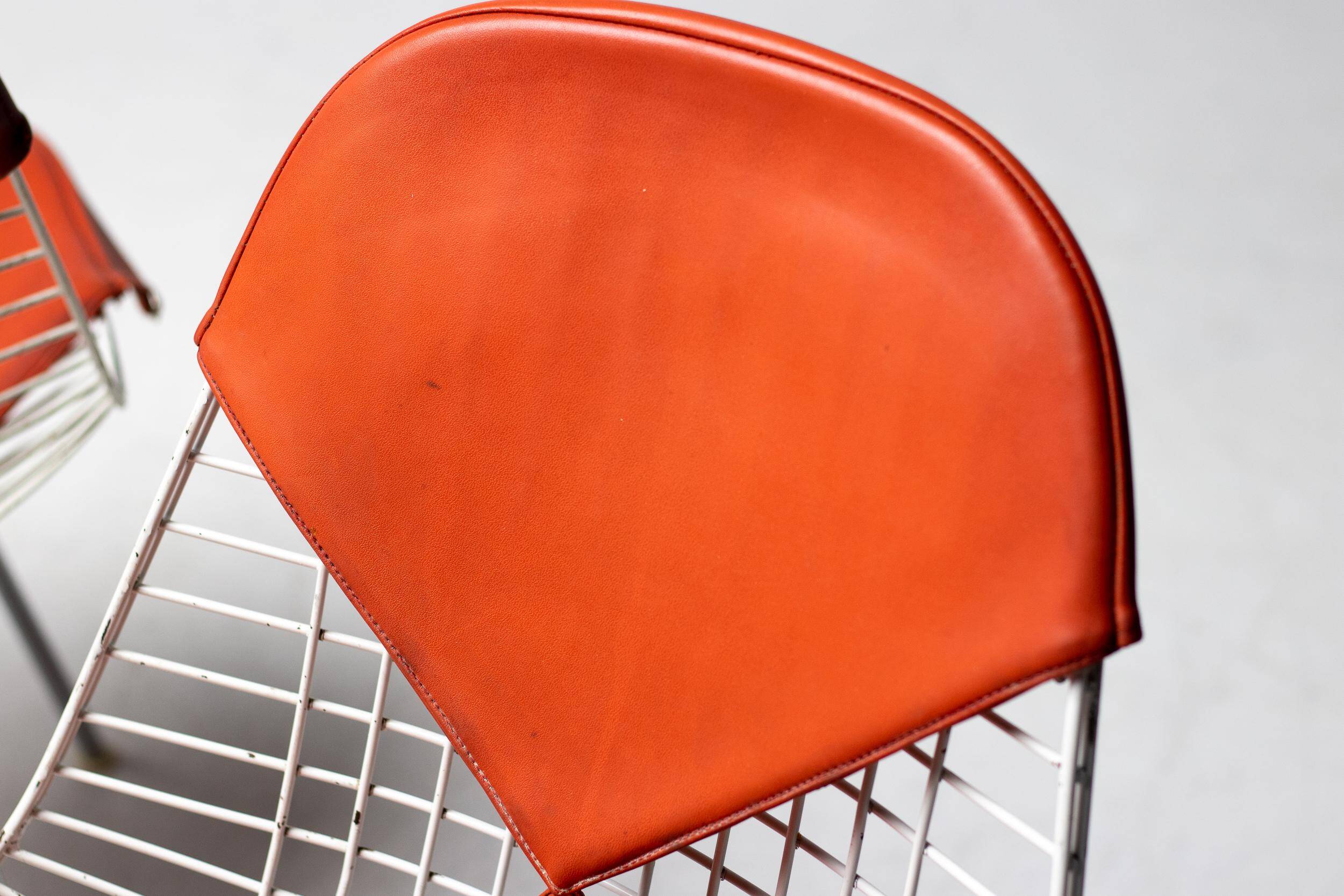 Set of 4 Eames wire chairs for Herman Miller with original Bikini seats by Girard.