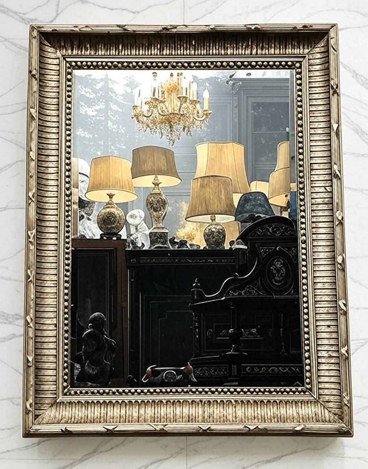 Mirror in a frame with a moulding.