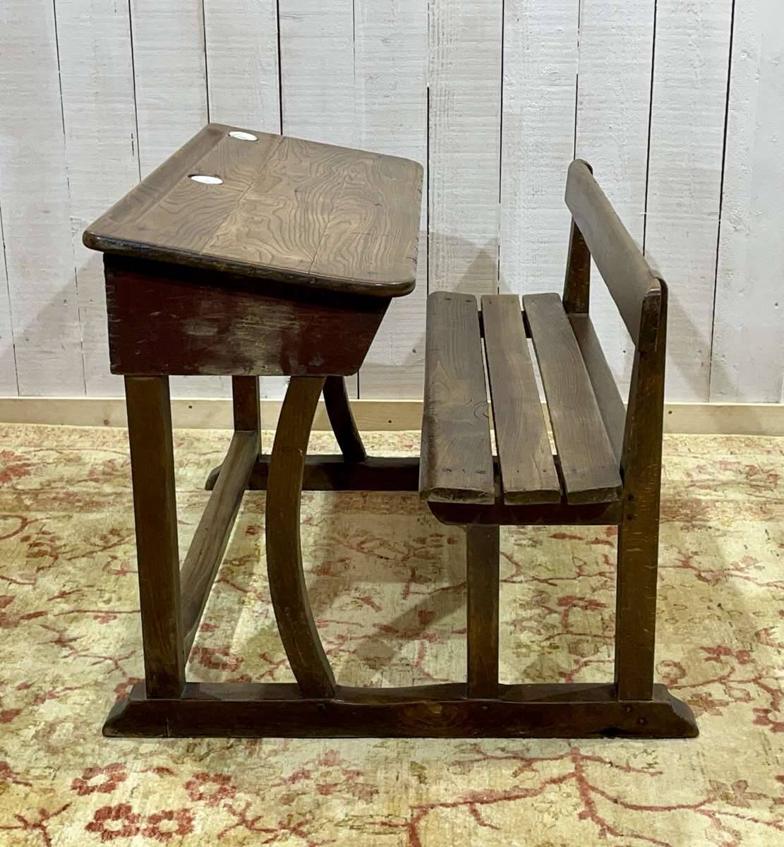 Early 20th-century oak school desk with porcelain inkwells