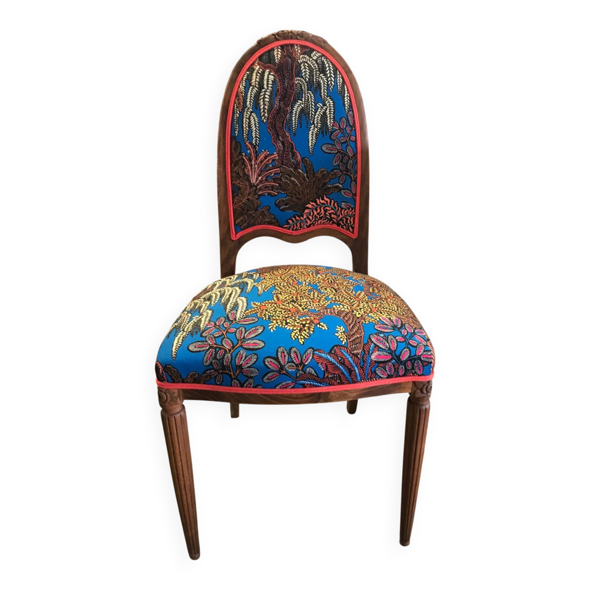 Art Nouveau chair with floral fabric and carved wood