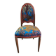 Art Nouveau chair with floral fabric and carved wood