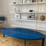 Oval coffee table in blue lacquered wood