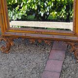 Old large Louis XV style mirror, stucco, wood, resin, beveled
