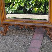Old large Louis XV style mirror, stucco, wood, resin, beveled