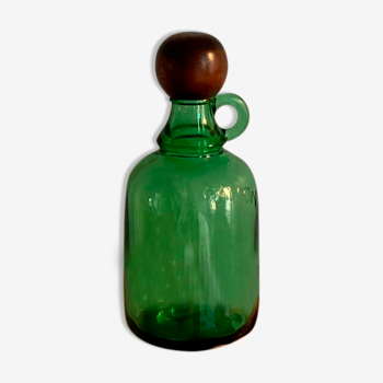 Glass bottle and its wooden stopper