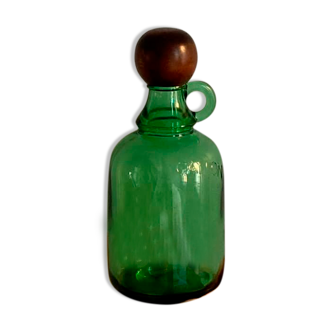 Glass bottle and its wooden stopper