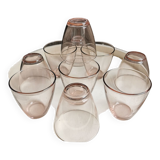 10 glasses of pink amber water