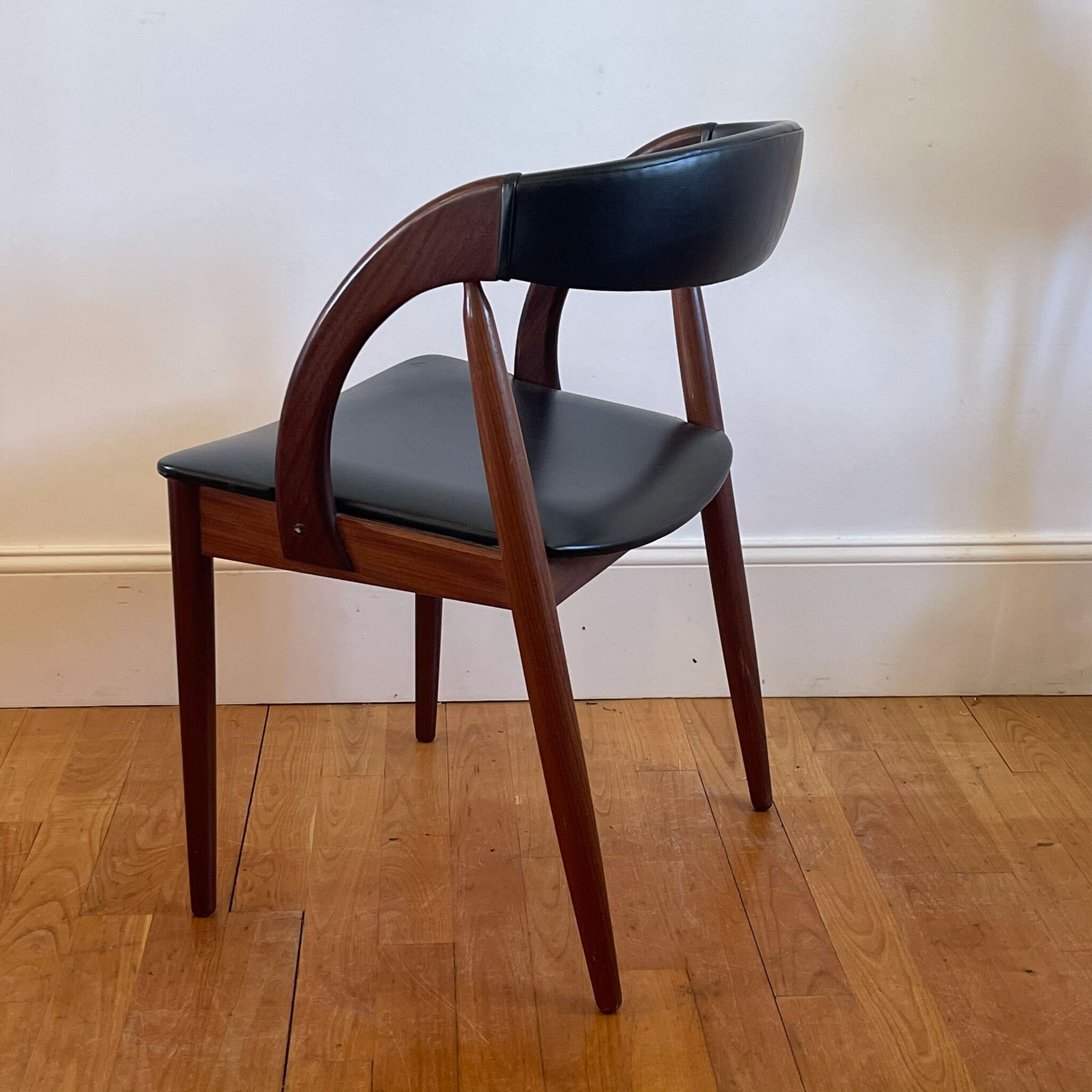 Vintage Danish chair in teak and skaï