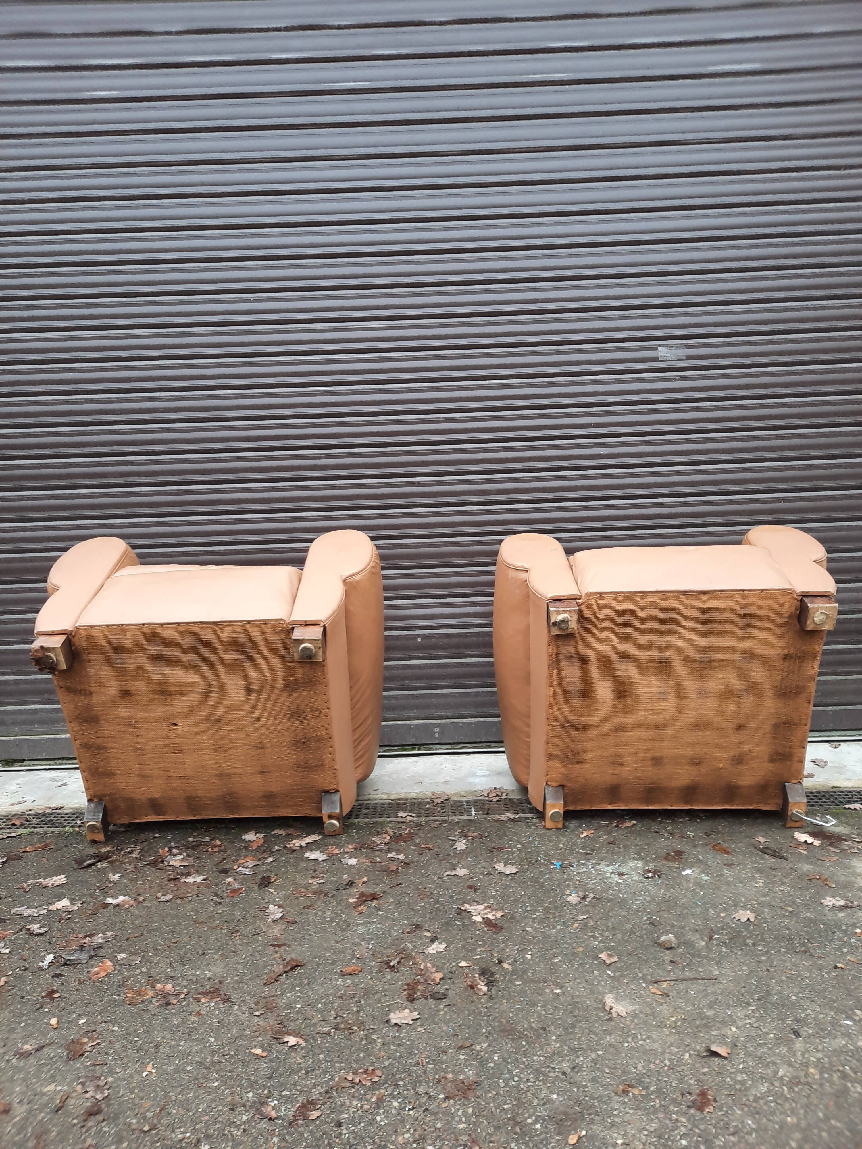 Pair of club chairs in skai