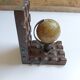 Wooden bookends globe world map