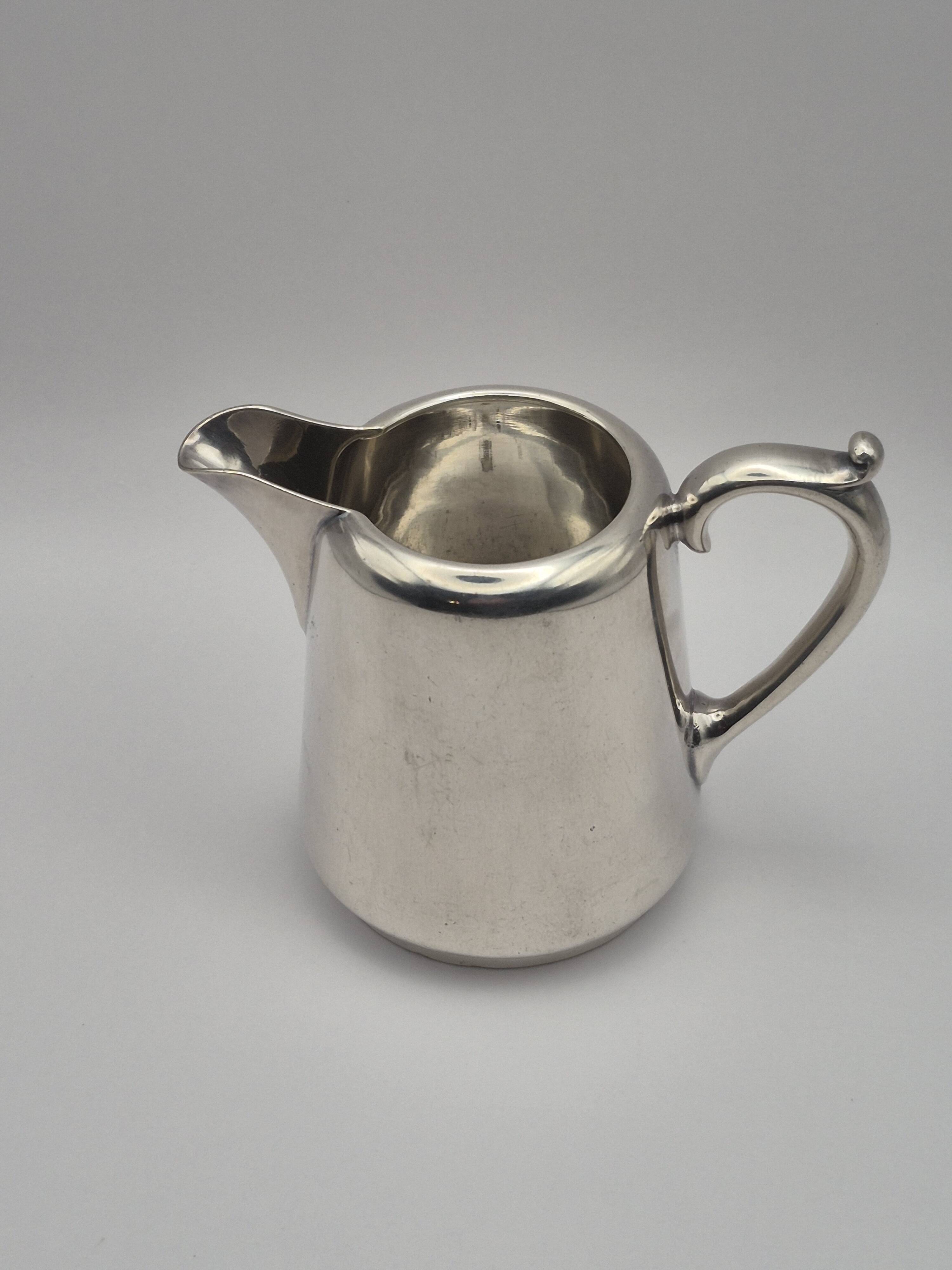 Superb vintage cream jug from the prestigious silversmithing house.