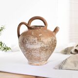 Old water jug. Gargoulette. Old terracotta pitcher.